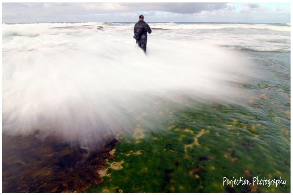 Jim Worrall hit by wave - photographer - Stephen Pretty